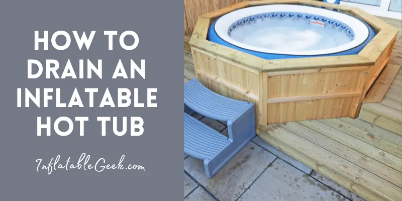Picture of an inflatable hot tub in a wooden gate - how to drain an inflatable hot tub